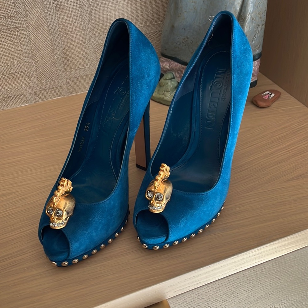 Blue suede high heeled peep toe pump